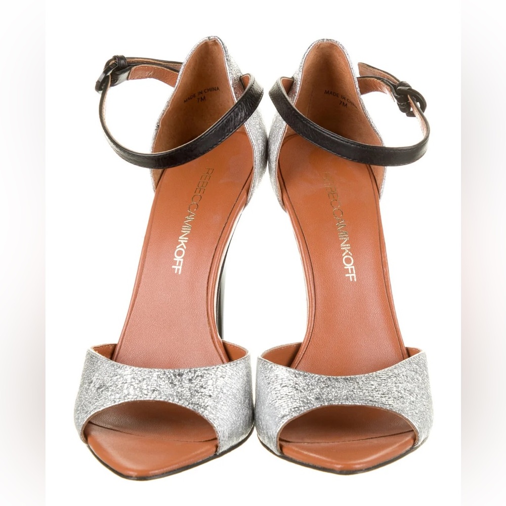 REBECCA MINKOFF… These are 🔥
Leather Colorblock Pattern D'Orsay Pumps
Size: 7